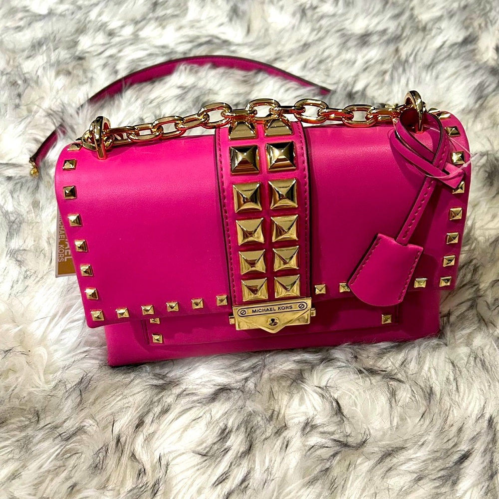 Beautiful fuchsia gold studded leather Michael Kors purse.Brand new with tags.